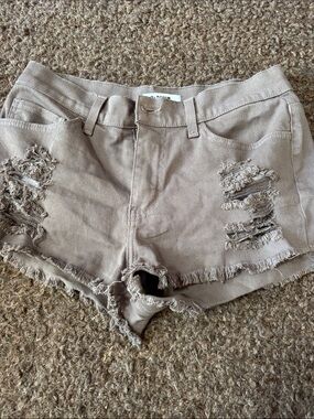 Frayed Hem Distressed Jean Shorts in Taupe from a boutique on Martha’s Vineyard